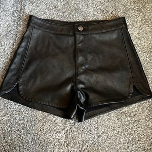 Divided ladies size 4 black faux leather shorts. Excellent condition